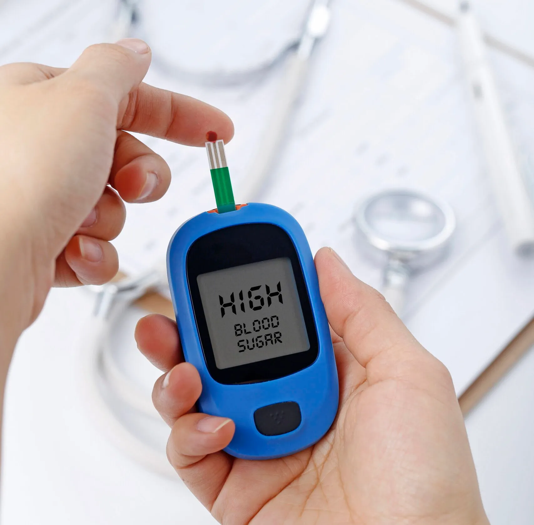 Blood glucose meter showing a high blood sugar reading